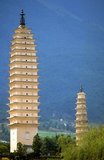 The Three Pagodas (the symbols of Dali) are an ensemble of three independent pagodas just north of the town of Dali dating from the time of the Nanzhao kingdom and the Kingdom of Dali.<br/><br/>

Dali is the ancient capital of both the Bai kingdom Nanzhao, which flourished in the area during the 8th and 9th centuries, and the Kingdom of Dali, which reigned from 937-1253. Situated in a once significantly Muslim part of South China, Dali was also the center of the Panthay Rebellion against the reigning imperial Qing Dynasty from 1856-1863. The old city was built during Ming Dynasty emperor Hongwu's reign (1368–1398).
